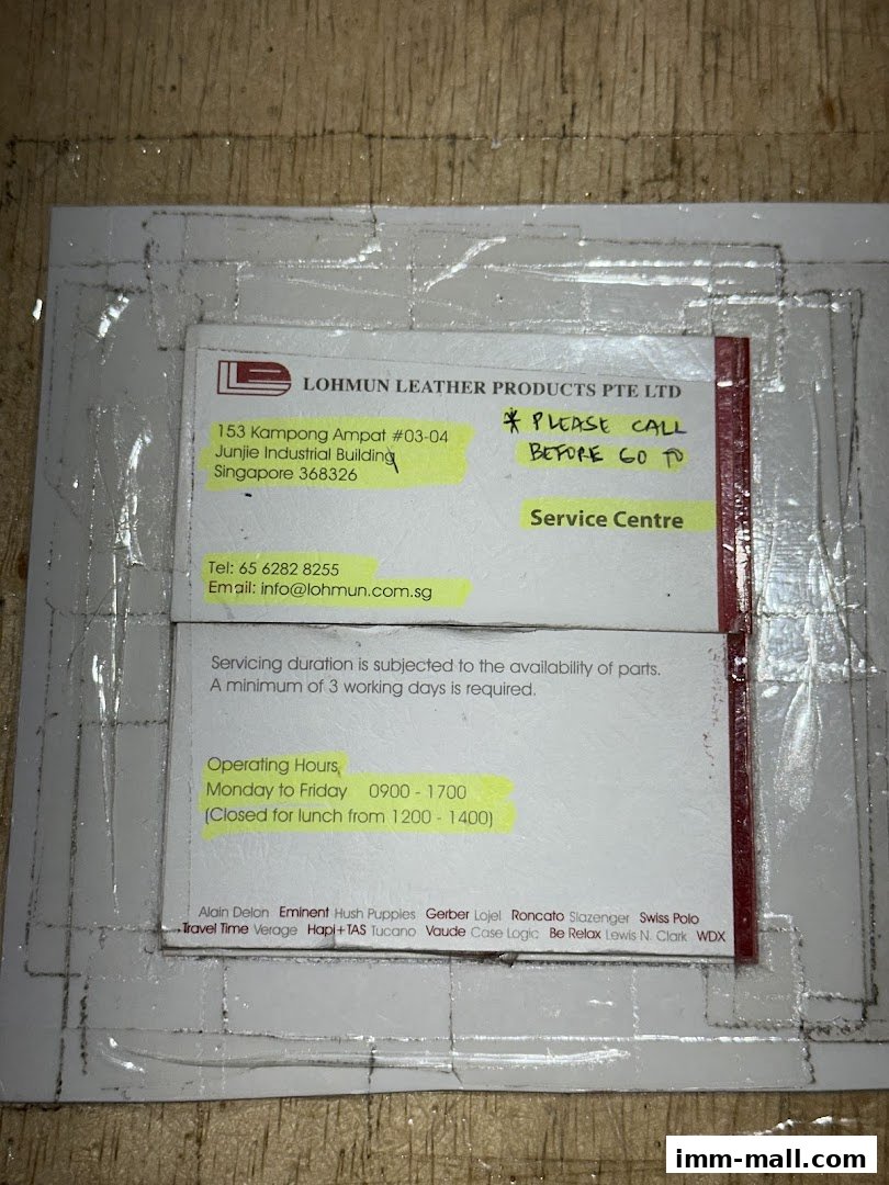 A business card for Lohmun Leather Products Pte Ltd with contact and operating information.