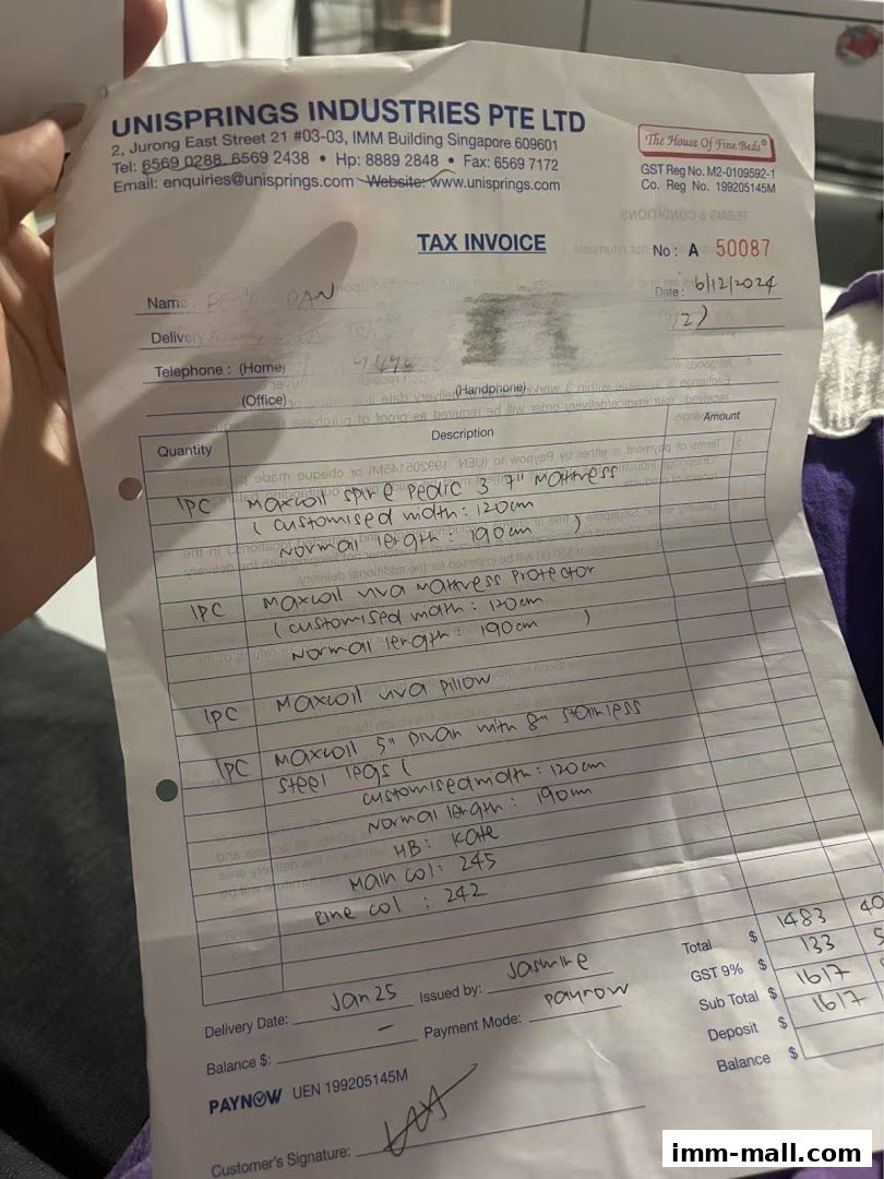 A tax invoice from Unisprings Industries Pte Ltd detailing mattress and pillow purchases.