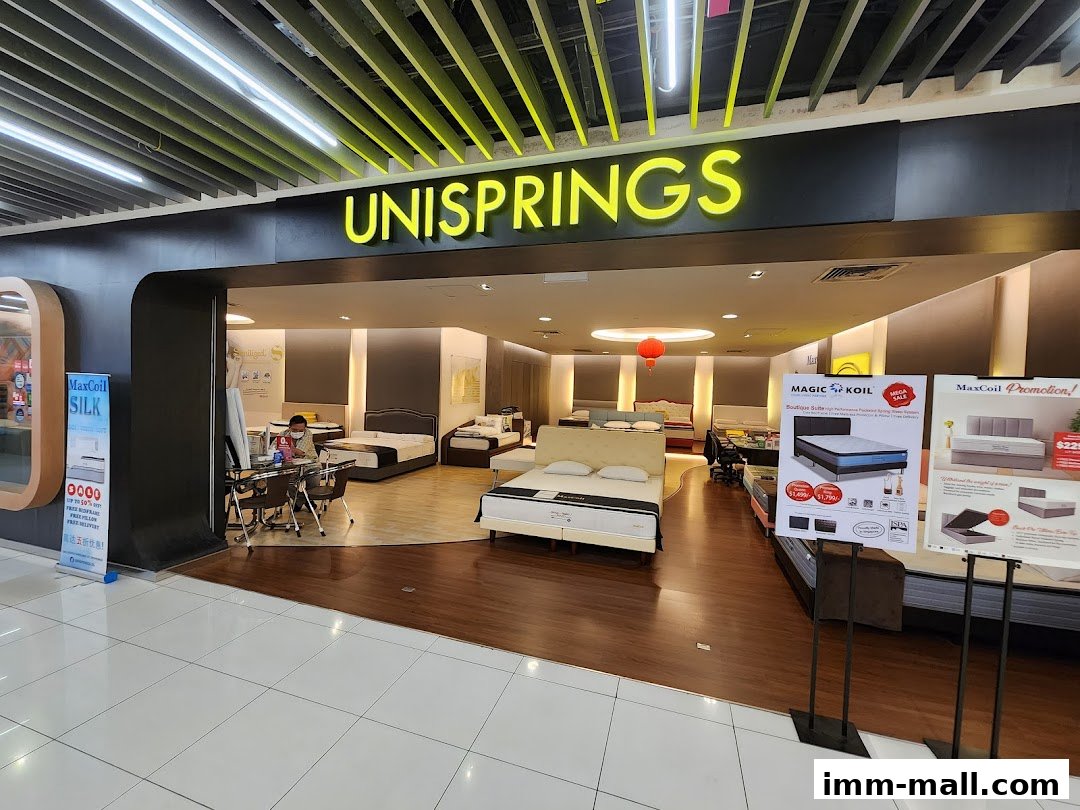 The Unisprings mattress store features a wide selection of beds and promotional displays.