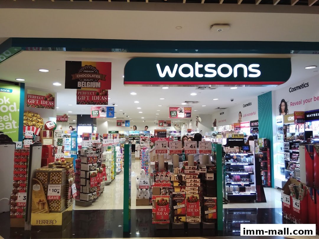 The entrance of a Watsons store, featuring displays of chocolates and gift ideas.