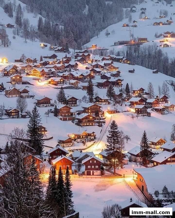 A picturesque village nestled in a snowy mountain landscape at dusk, with warm lights illuminating the houses.