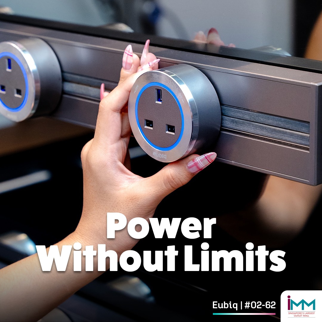 A sleek and modern Eubiq power track system installed in a contemporary home office.