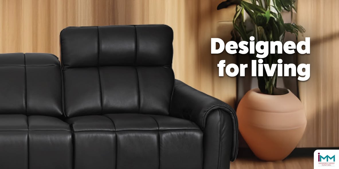 Elegant three-seater sofa in a modern living room setting